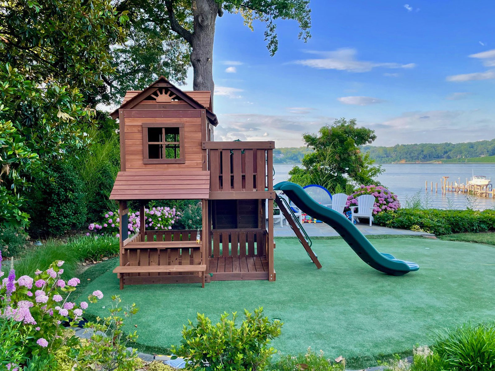 Photo of a Creative Playthings swing set in a customer's yard.